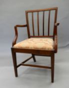 A 19th century mahogany open armchair. 60 cm wide.