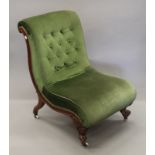 A 19th century upholstered walnut nursing chair. 57 cm wide.