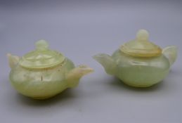 Two jade teapots. Each 8 cm long.