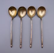 Four Russian silver spoons. 13 cm long.