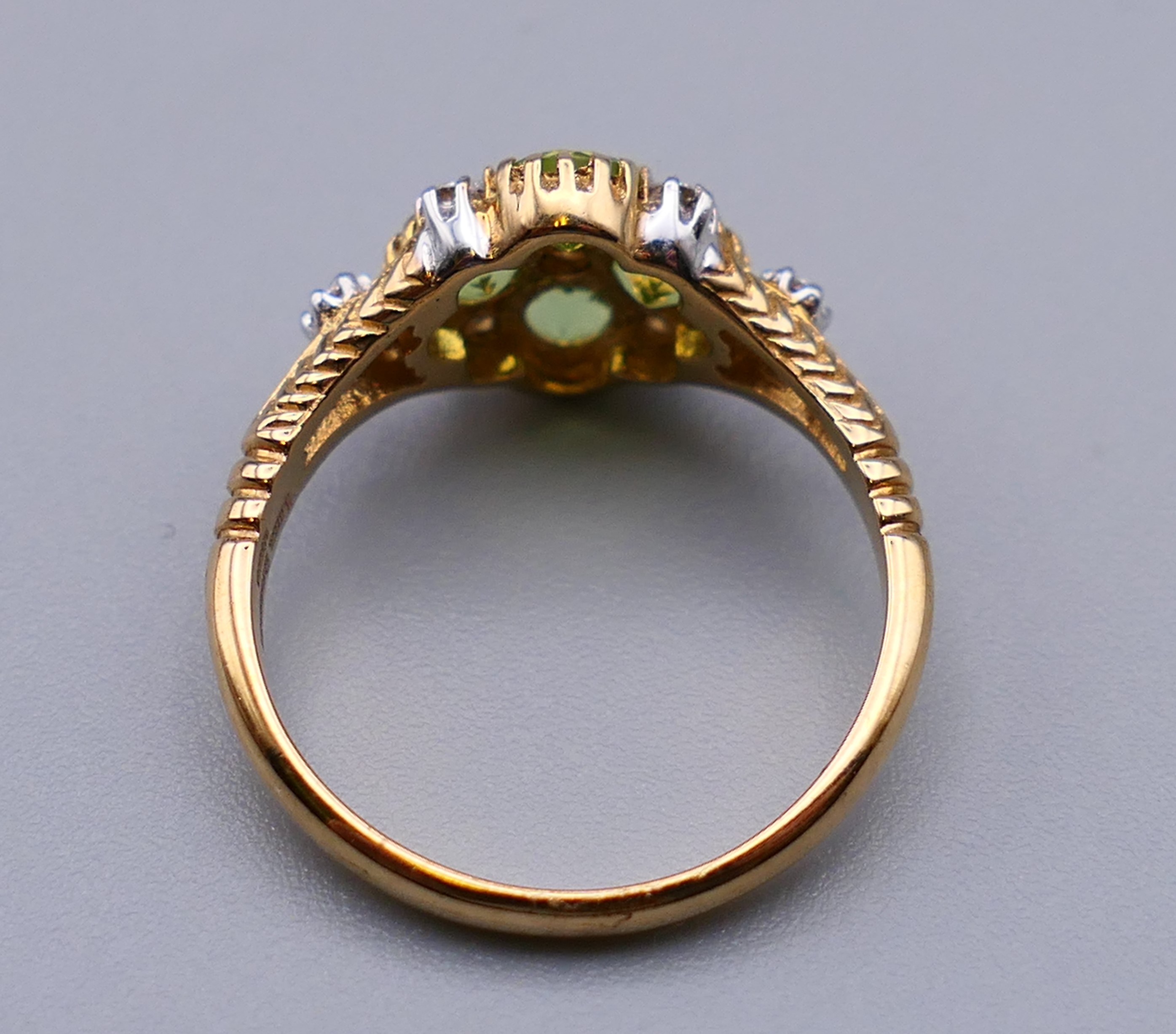 A 9 ct gold Victorian style diamond and peridot ring, engraved design to the sides. Ring size M/N. - Image 4 of 7