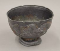 A Japanese footed bowl. 14 cm diameter.