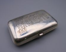 A Russian silver cigar case. 11.5 cm wide. 156.3 grammes.