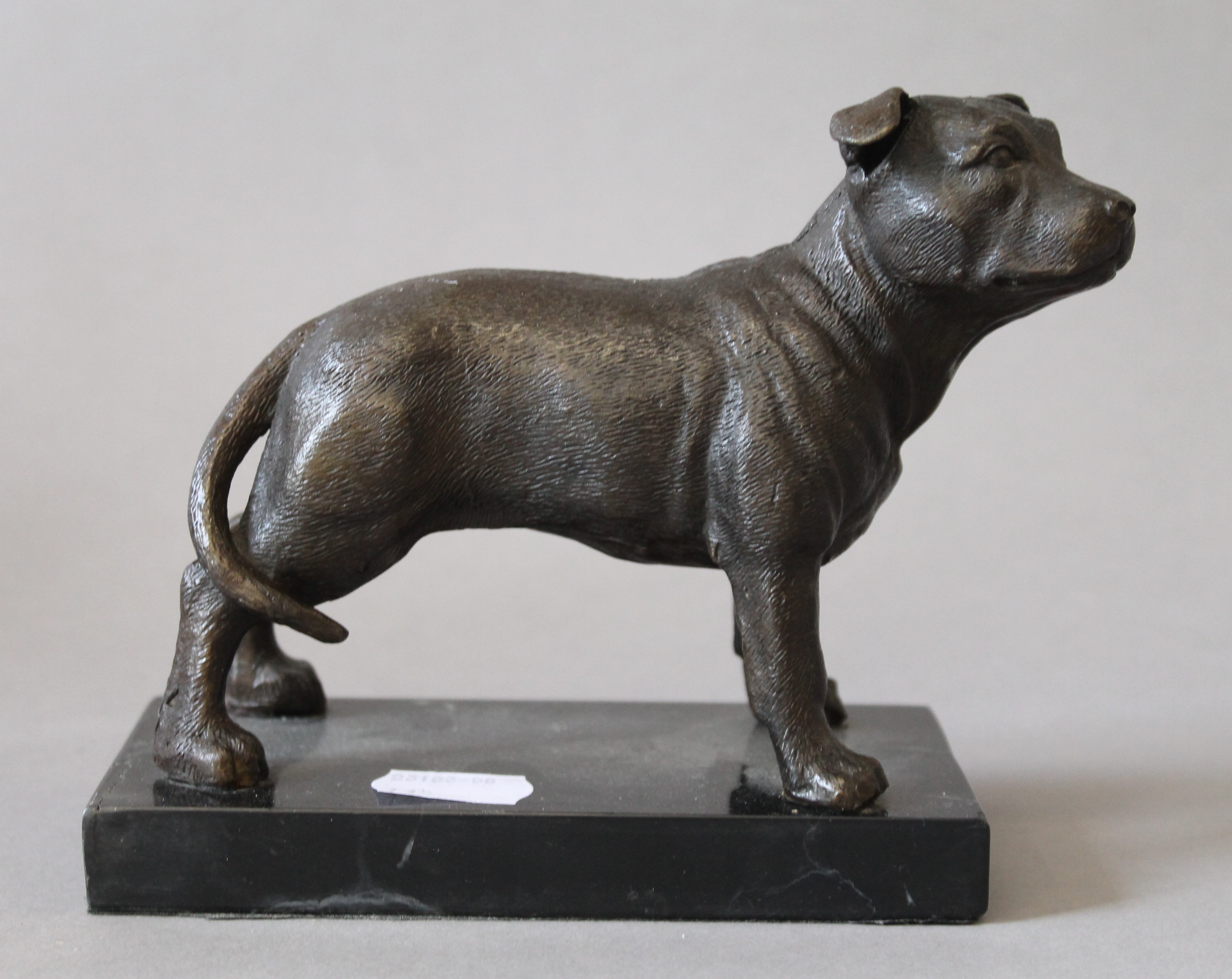 A bronze bulldog on marble base. 16 cm long.