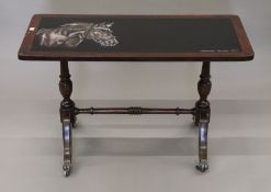 A mahogany coffee table painted with a horse. 81 cm long.