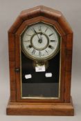 A 19th century rosewood cased mantle clock. 44.5 cm high.