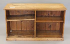 A pine bookcase. 126 cm wide.