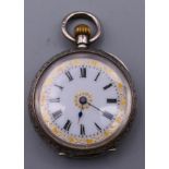 A 935 silver pocket watch. 3.25 cm diameter.