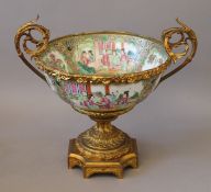 A 19th century Chinese Canton porcelain bowl with ormolu mounts.