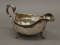 A large silver sauce boat. 21 cm long.