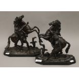 A pair of 19th century patinated bronze Marley horses. Each 27 cm high.