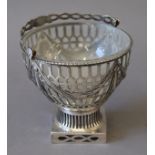 An unmarked silver glass lined basket. 11 cm wide. (157.