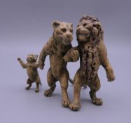 A cold painted bronze model of a lion family. 6.5 cm high.