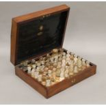 A 19th century mahogany cased homoeopathic medicine set by Mawson of Newcastle. 33 cm wide.