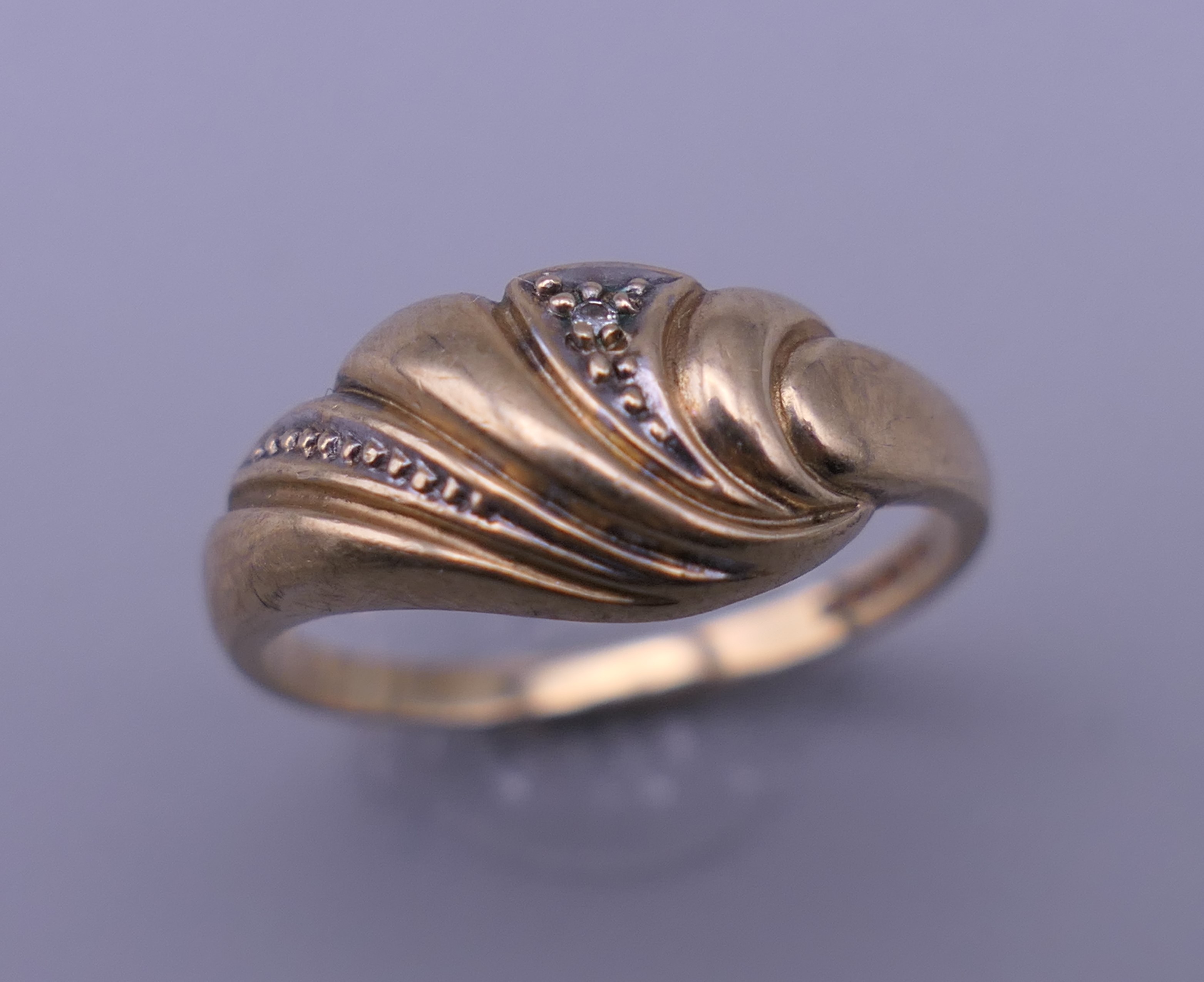 A 9 ct gold ring. Ring size L/M. 2.3 grammes total weight.