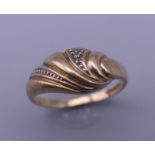 A 9 ct gold ring. Ring size L/M. 2.3 grammes total weight.