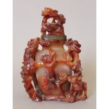 A Chinese carved agate vase. 17 cm high.