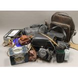 A quantity of miscellaneous camera equipment.