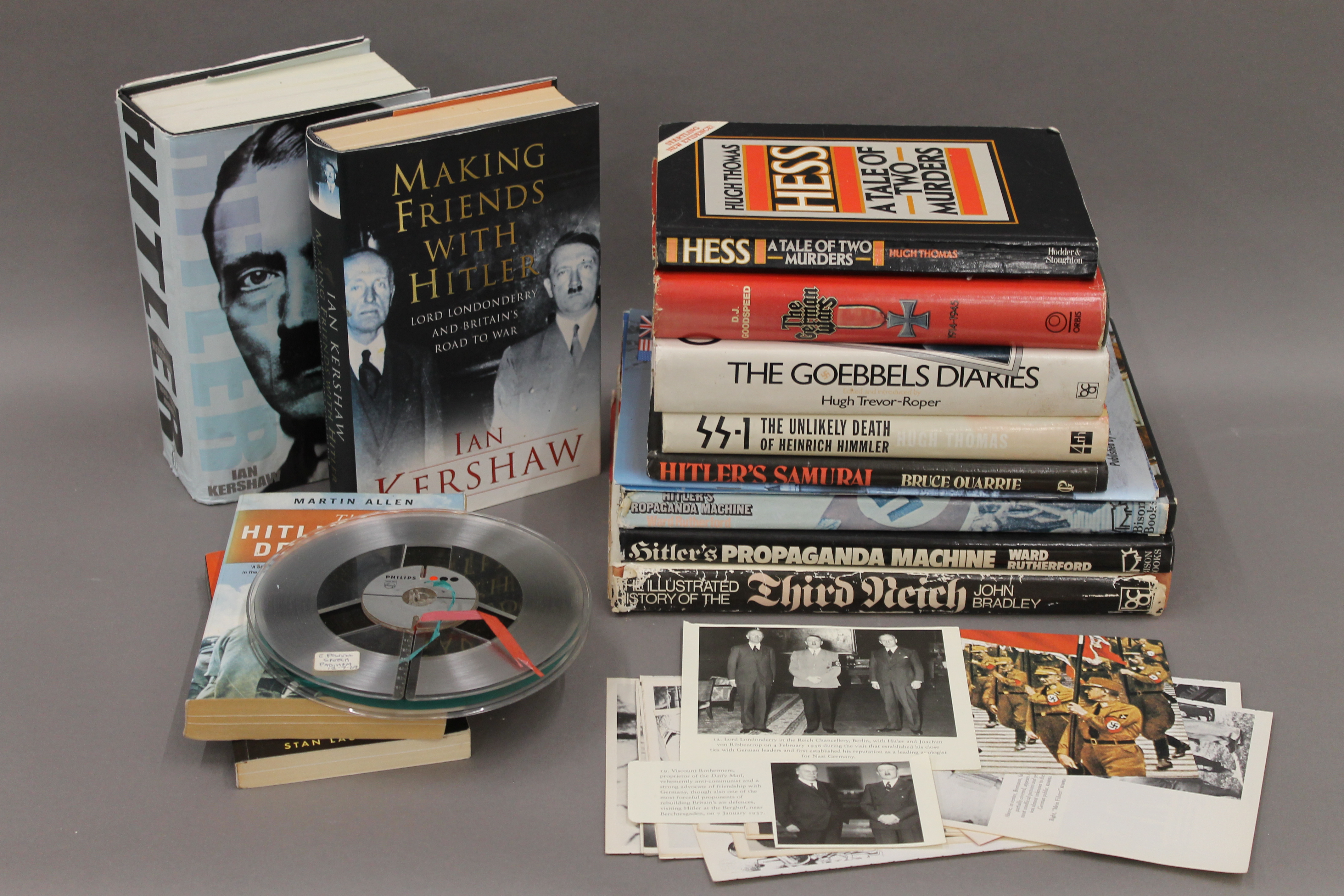 A quantity of books pertaining to Adolf Hitler, photographs, etc.