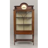 An Edwardian inlaid mahogany glazed display cabinet. 76 cm wide.