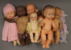 A quantity of vintage dolls.