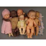 A quantity of vintage dolls.