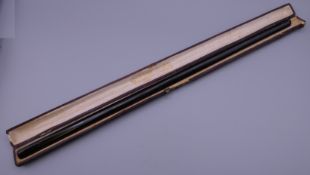 A large vintage cased cigarette holder.