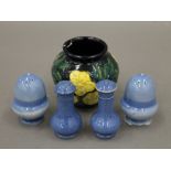 Two pairs of Moorcroft powder blue peppers, together a small Moorcroft vase. The latter 7.5 cm high.