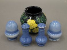 Two pairs of Moorcroft powder blue peppers, together a small Moorcroft vase. The latter 7.5 cm high.