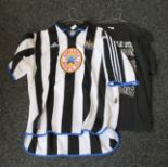 A Newcastle United football shirt with ''BIG MAC'' and the number nine printed to the reverse,