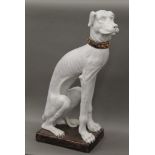 An Italian glazed pottery model of a dog. 102 cm high.