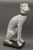 An Italian glazed pottery model of a dog. 102 cm high.