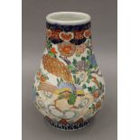 A 19th century Japanese Imari porcelain bulbous shaped vase. 25.5 cm high.
