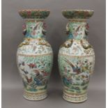 A pair of large 19th century Canton famille rose vases. 64 cm high.
