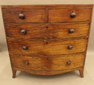 A George III mahogany bowfront chest of drawers. 107 cm wide.