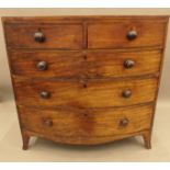 A George III mahogany bowfront chest of drawers. 107 cm wide.