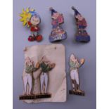 A collection of enamel badges, including Noddy.