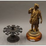 A spelter figure and a stamp holder. The former 33.5 cm high.