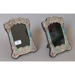 A pair of Art Nouveau style silver photograph frames. 16 x 21 cm.