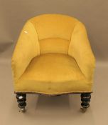 A Victorian upholstered tub chair. 61 cm wide.