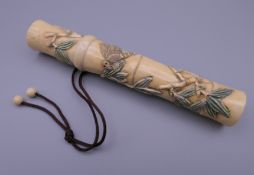 A Japanese bone cigar holder. 13.25 cm long.