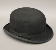 A Dunn & Co bowler hat.