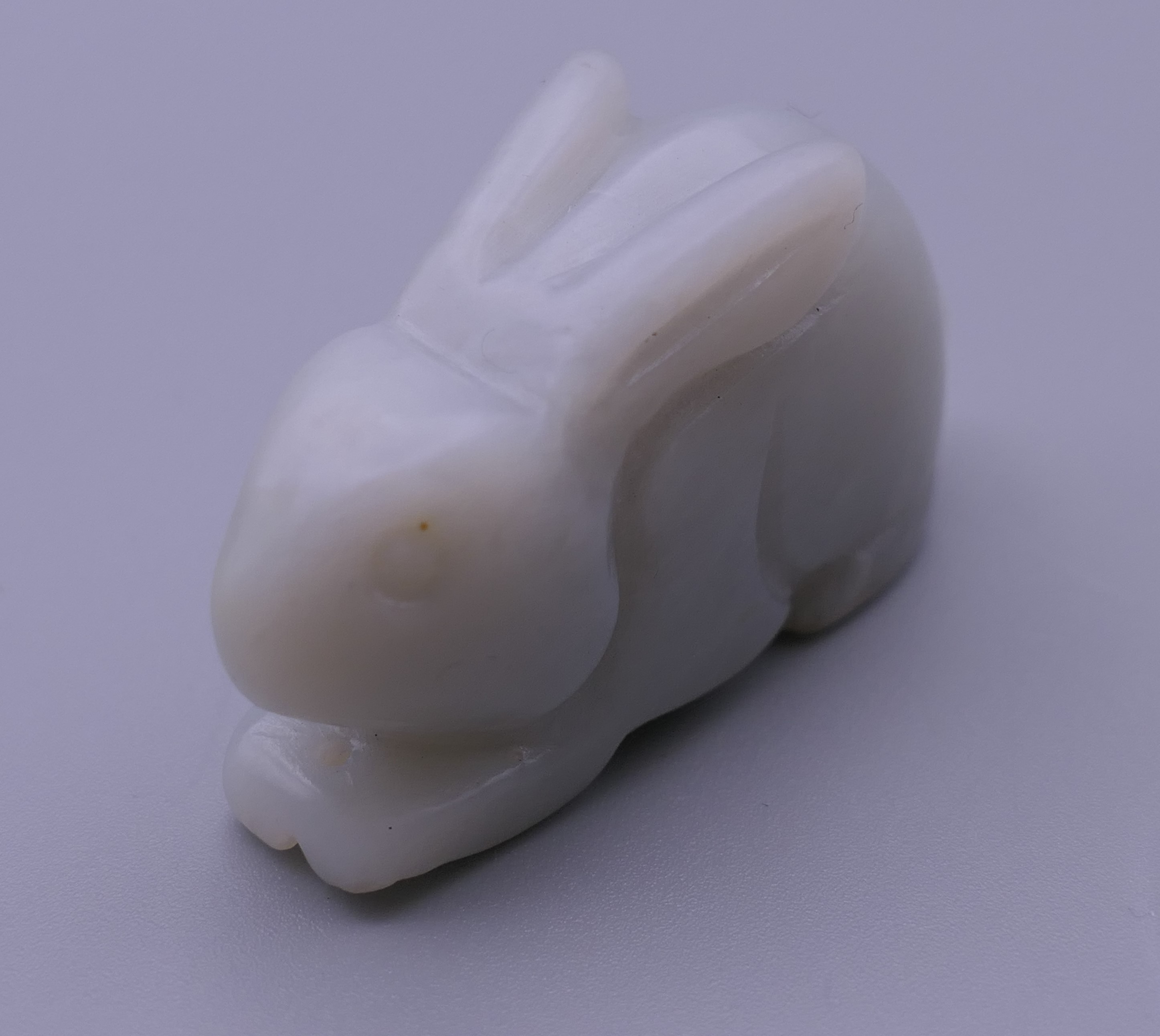 A jade carving of a rabbit. 4.5 cm long. - Image 5 of 5