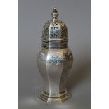 A silver sugar sifter. 17 cm high. 216.3 grammes.