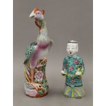 A 19th century Chinese porcelain bird and an 18th century Chinese porcelain figure of a laughing