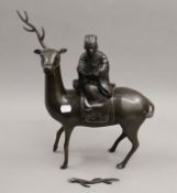 An 18th/19th century Chinese bronze deer and sage form censer. 40 cm high.