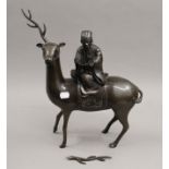 An 18th/19th century Chinese bronze deer and sage form censer. 40 cm high.