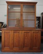 A Victorian pine school cupboard,