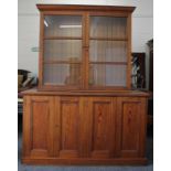 A Victorian pine school cupboard,