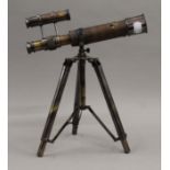 A telescope on stand. 25.5 cm long.